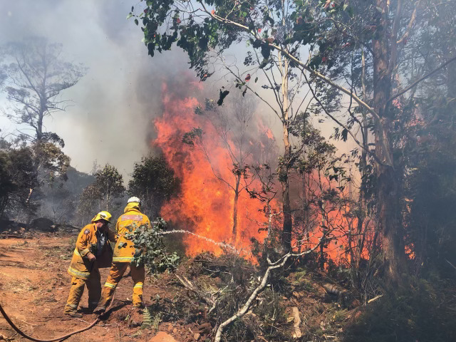 fire fighters tackling a blaze at Central Highlands